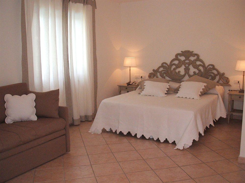 Гостевой дом Relais Fenicottero Rosa Порто-Таверна Экстерьер фото