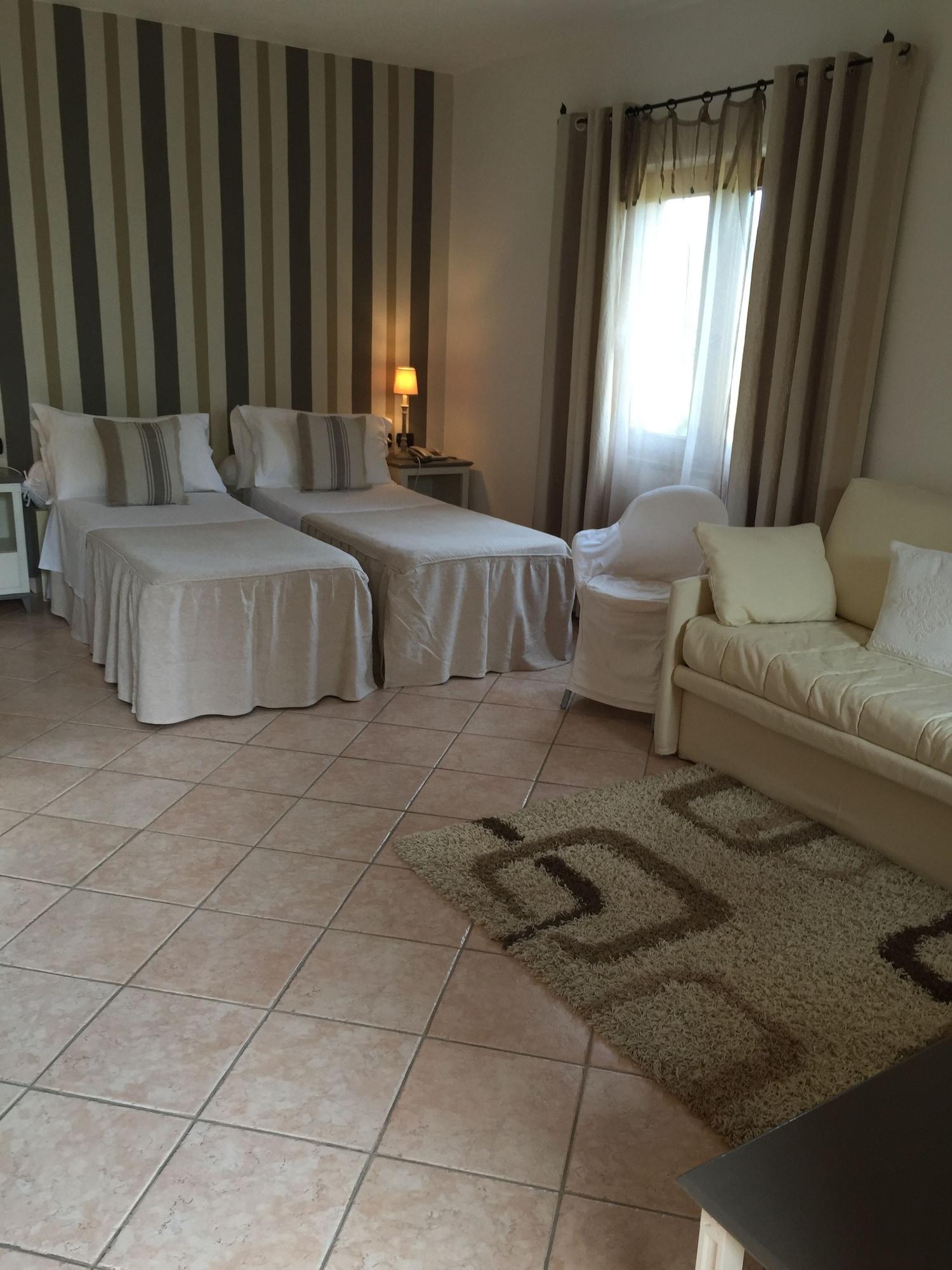 Гостевой дом Relais Fenicottero Rosa Порто-Таверна Экстерьер фото