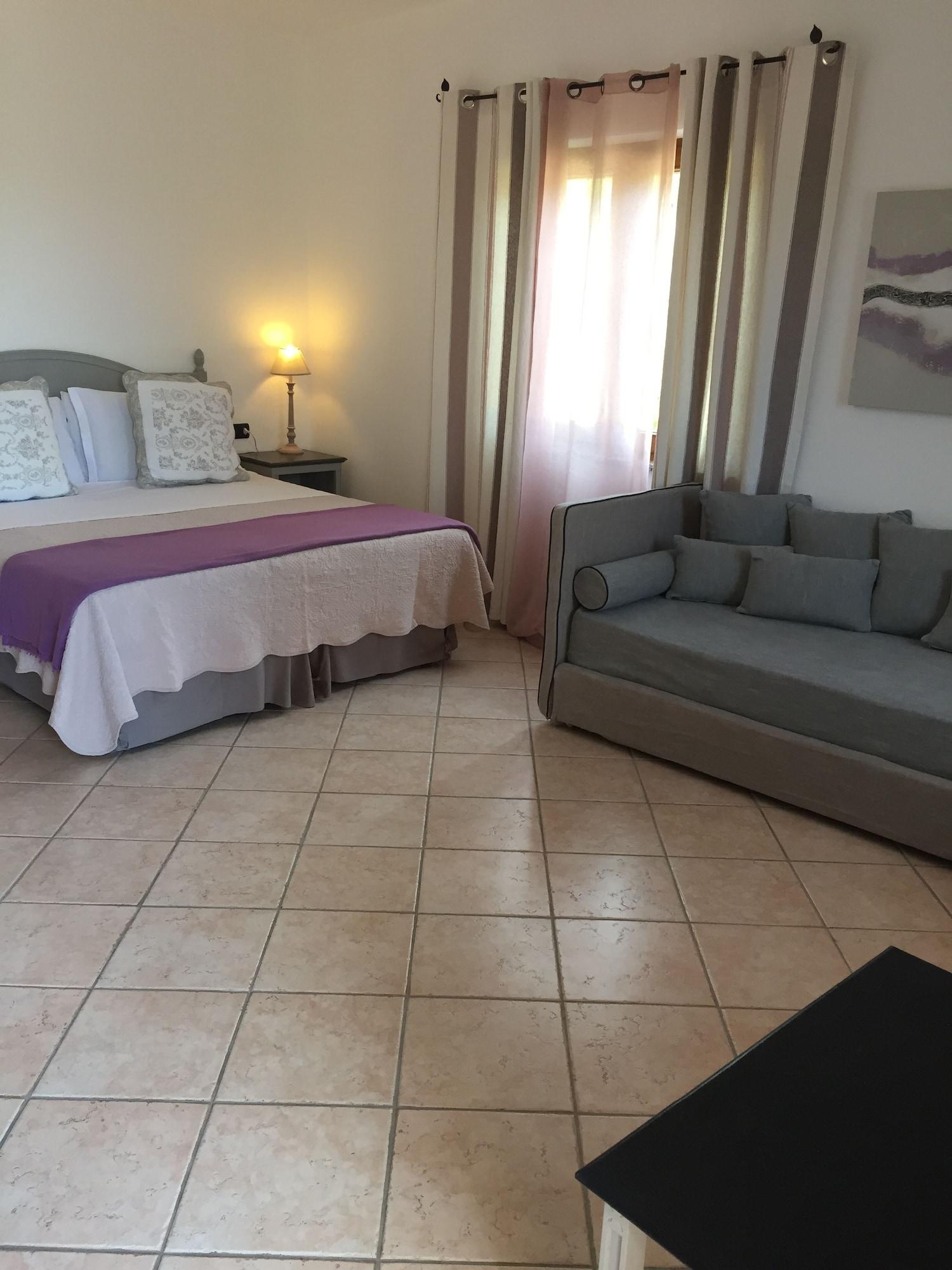 Гостевой дом Relais Fenicottero Rosa Порто-Таверна Экстерьер фото